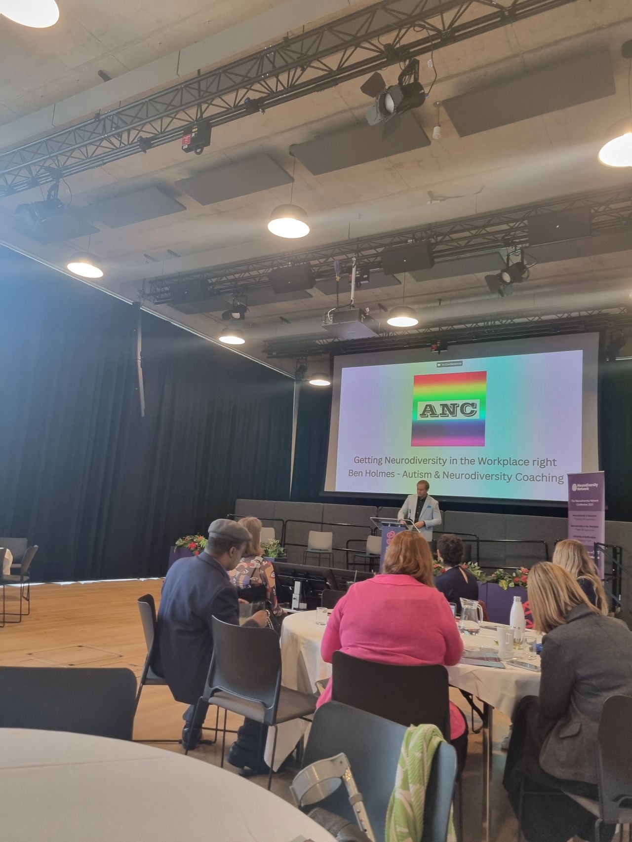 Ben Holmes speaking at the Neurodiversity Network Conference